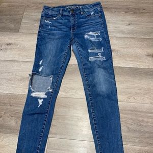 American Eagle high rise skinny jeggings, size 8, distressed blue denim jeans